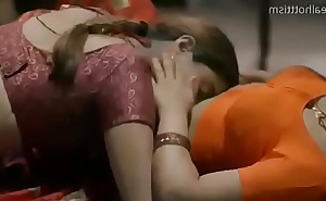 Sexy making of men connected with saree giving a kiss